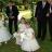 Lovely little flower girls scattering rose petals